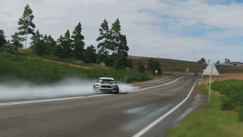 Racing Car Driving on Road
