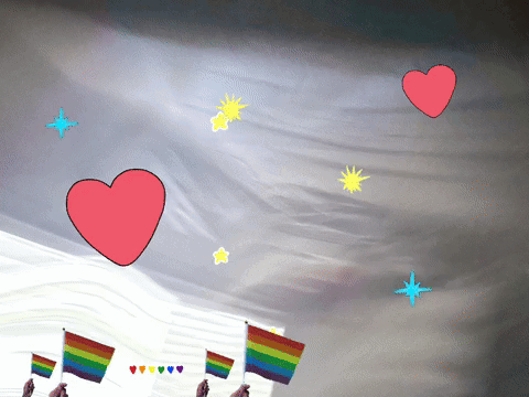 Rainbow Flag Held in Stormy Sky With Hearts and Stars