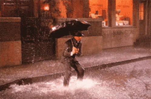 Rainy Saturday Man Stamping On Puddle GIF