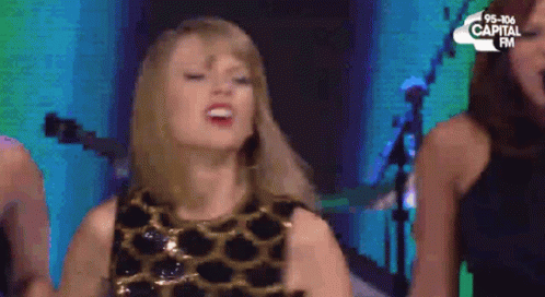 Taylor Swift Energetic Raising Hand GIF