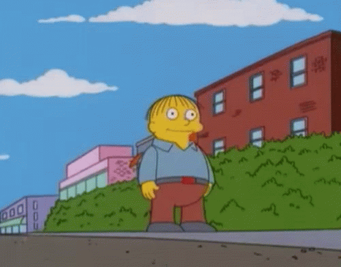 Ralph From The Simpsons Standing On Sidewalk GIF