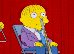 Ralph Wiggum Playing Flute With His Nose GIF