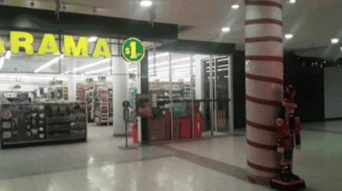 Rama 1 Store In A Mall With A Nutcracker In Front Of It GIF