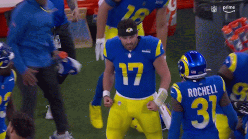 Rams Players Standing on Field
