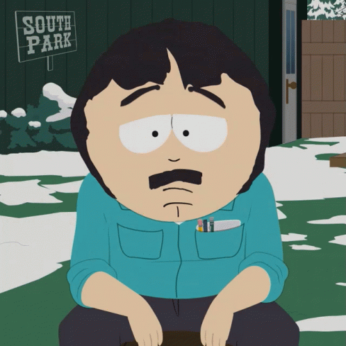 Randy Marsh Sitting in Front of South Park Sign