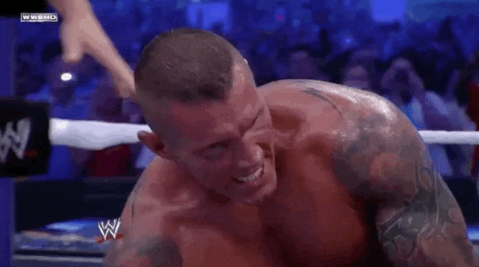 Randy Orton In Pain Spitting Mouth Guard GIF