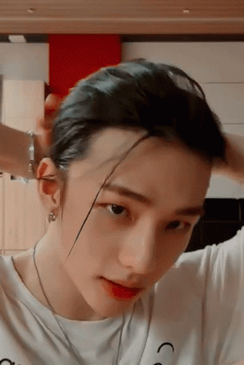 Rapper Hyunjin Tying Up Hair GIF