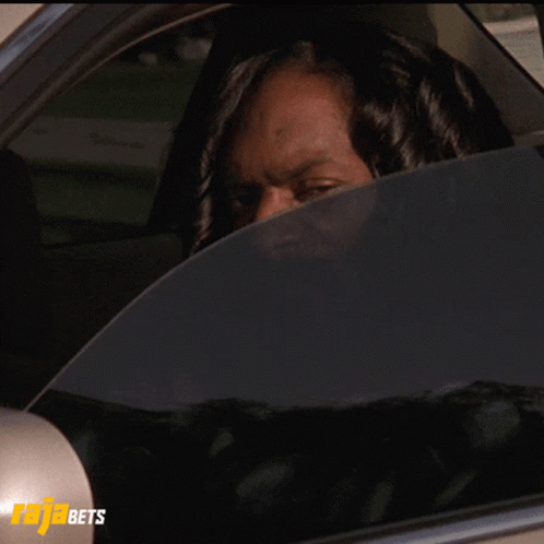 Rapper Snoop Dog Stank Face In Car GIF