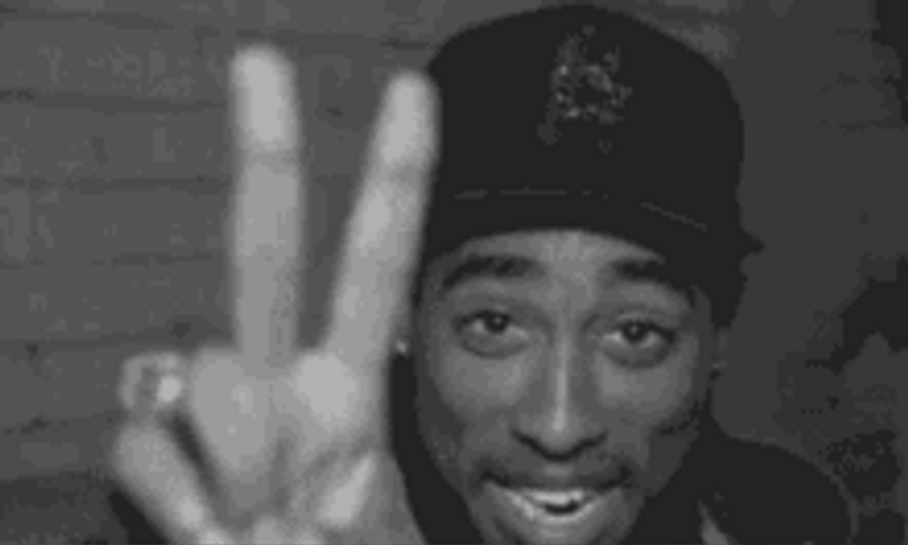 Rapper Tupac Shakur Smiling 2 Finger Sign GIF