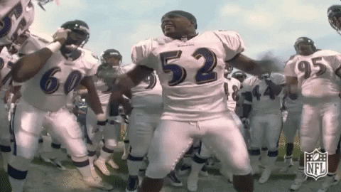Ray Lewis In Middle Of Teammates GIF