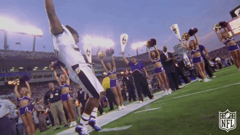Ray Lewis Skipping Toward His Teammate GIF