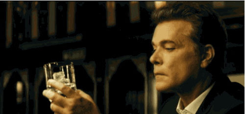Ray Liotta Checking Out Liquor Glass GIF
