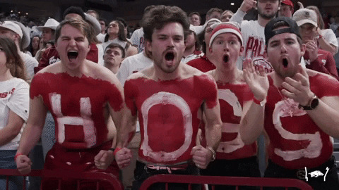 Razorbacks Fan Painted Body Saying Hogs GIF