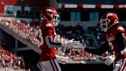 Razorbacks Players Doing Handshake GIF