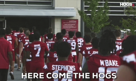 Razorbacks Players Walking Together Entering Building GIF