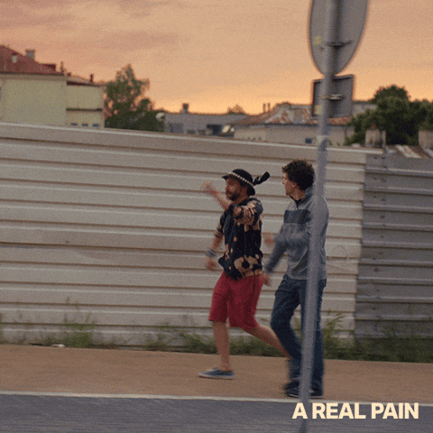 Real Pain Nostalgic Power Walking GIF