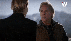 Rebecca Rittenhouse Holding A Mic GIF