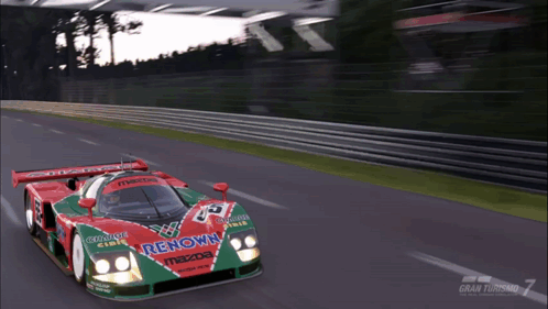 Red and Green Renown Mazda Race Car Driving