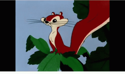Red and White Cartoon Squirrel Sitting on Green Leaf