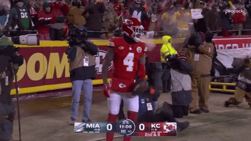 Red and White Jersey Man in Locker Room