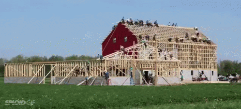 Red Barn Being Built in Field