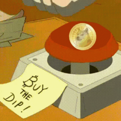 Red Button With Doge Coin and Note Saying Buy the Dip