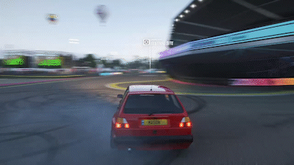 Red Car Driving on Race Track Saying Driving Elite