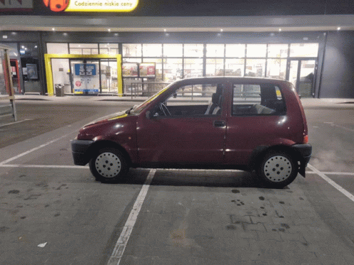 Red Car Parked At Codziennie Niskie Ceny GIF