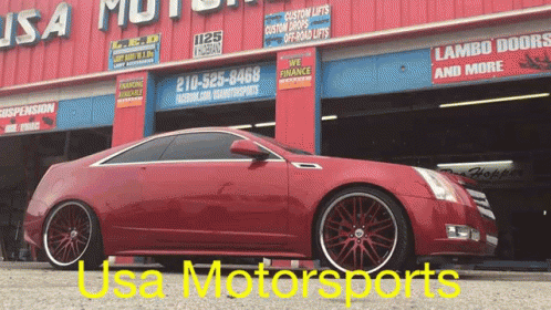 Red Car Parked Outside USA Motorsports