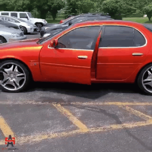 Red Car Parked With Adams GIF