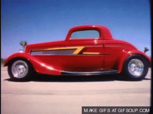 Red Car With Yellow Stripe Says Make Gifs At Gifsoup.com GIF