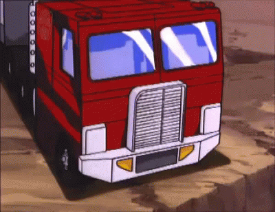 Red Cartoon Truck Driving Down Road