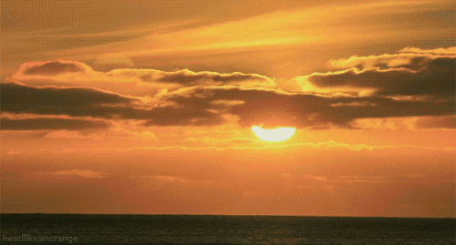 Red Dawn Passing Clouds GIF