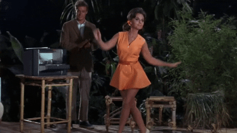 Red Dawn Wells In Pink Dress GIF