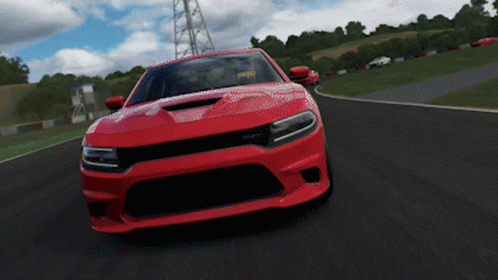 Red Dodge Charger Driving on Track