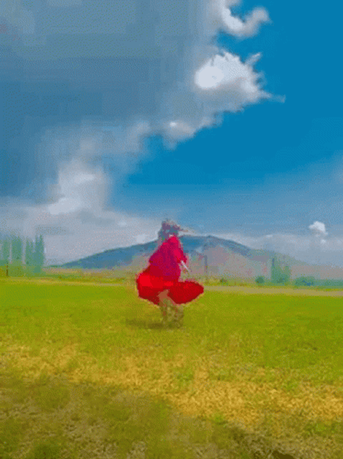 Red Dress In Mountain GIF
