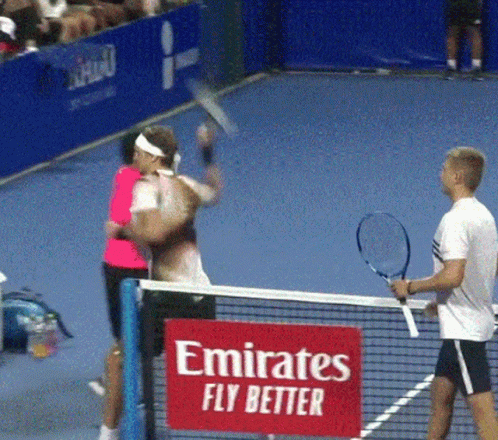Red Emirates Fly Better Sign on Tennis Net