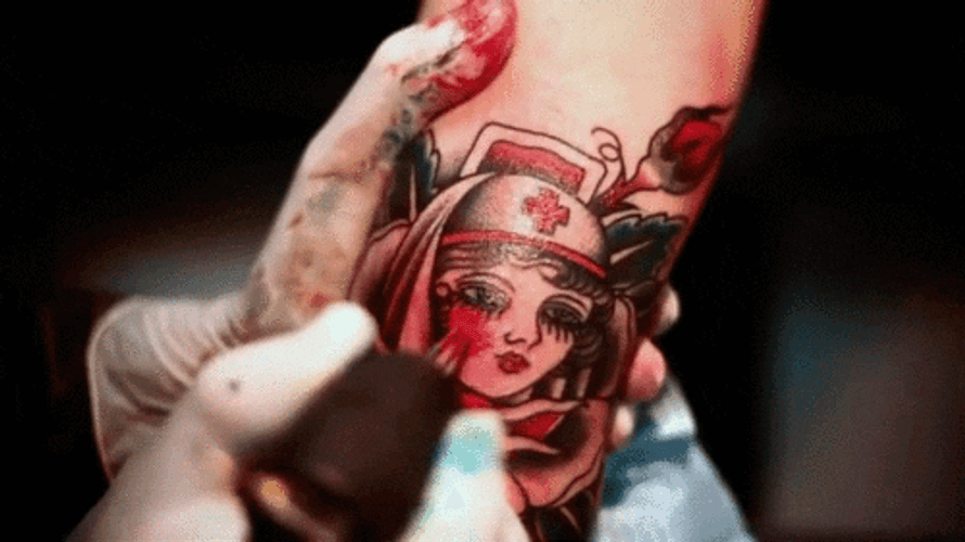 Red Face Nurse Tattoo GIF