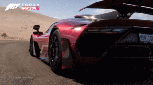 Red Forza Horizon Car Driving Down Road