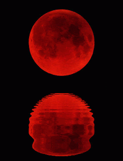 Red Full Moon Reflected in Water