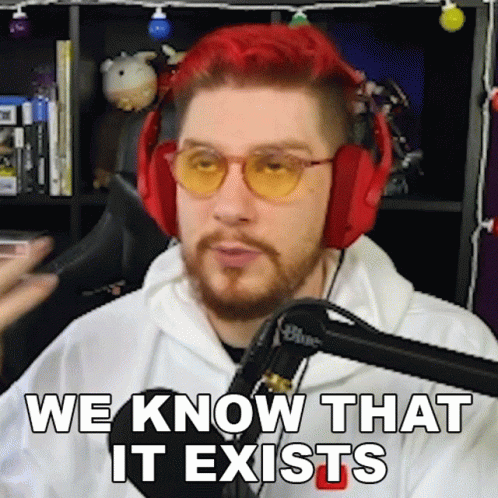 Red Hair Beard Man With Headphones Sunglasses Says We Know That It Exists