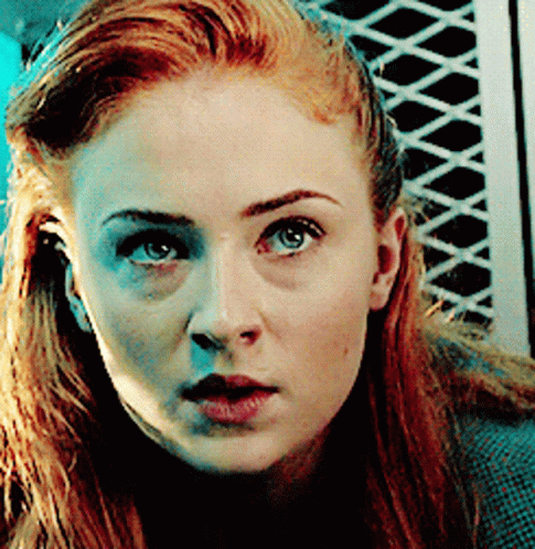 Red Hair Woman Looking at Camera