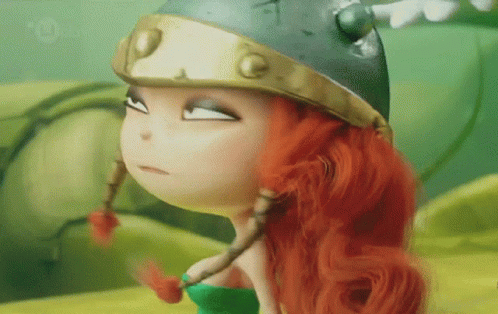Red-Haired Doll in Helmet and Green Top