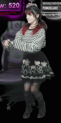 Red-Haired Girl Dancing By Purple Chair 520 GIF