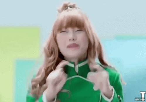 Red-Haired Girl in Green Jacket Funny Face