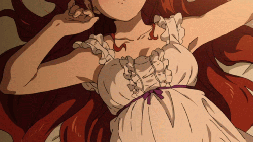 Red-Haired Girl Lying On Bed In White Dress GIF