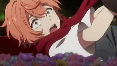 Red-Haired Girl With Scarf Laying On Ground GIF
