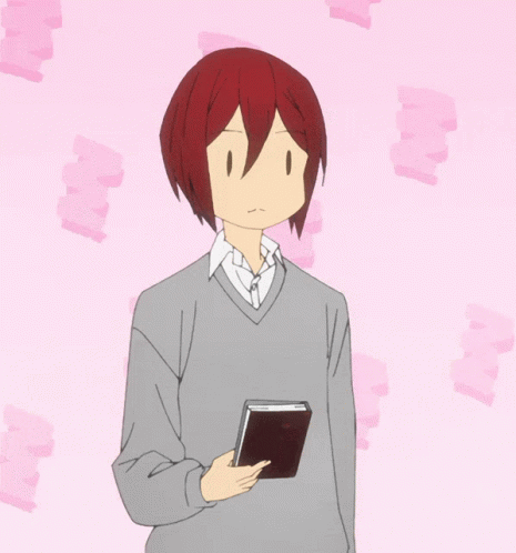 Red-Haired Man Holding Book