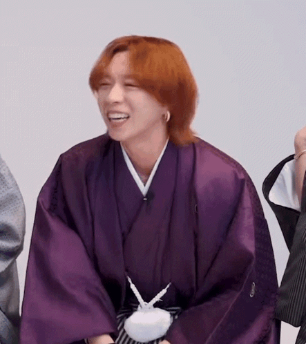 Red-Haired Man in Purple Kimono Smiling