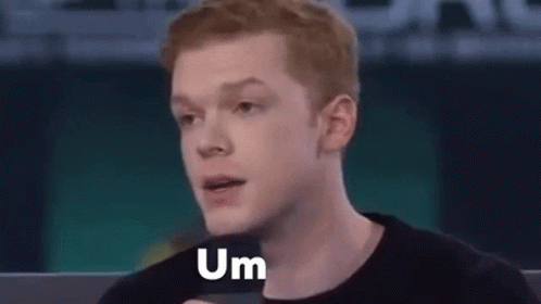 Red-Haired Man Making Funny Face at Microphone